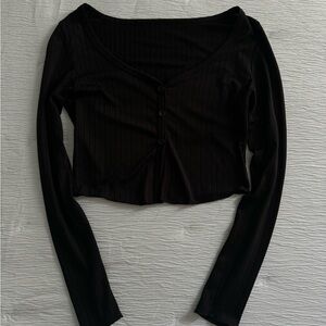 Black ribbed long sleeve crop top with button up detail